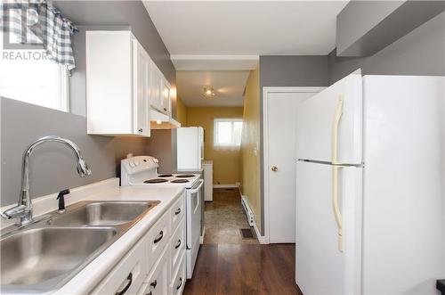 50 Academy Street, Hillsborough, NB - Indoor Photo Showing Kitchen With Double Sink