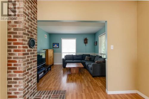 50 Academy Street, Hillsborough, NB - Indoor Photo Showing Living Room With Fireplace