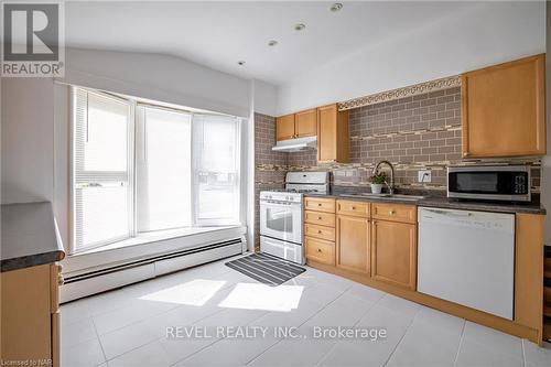 16 Dexter Street, St. Catharines, ON - Indoor Photo Showing Kitchen With Double Sink