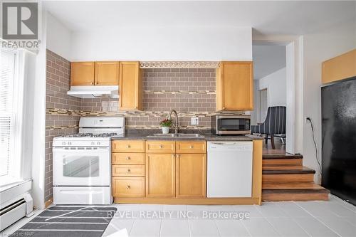 16 Dexter Street, St. Catharines, ON - Indoor Photo Showing Kitchen With Double Sink