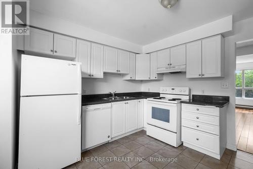 47 - 135 Belmont Drive, London, ON - Indoor Photo Showing Kitchen With Double Sink