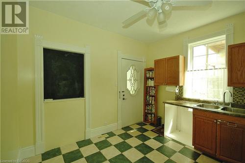 WALKOUT / ENTRANCE TO SIDE PORCH - 412 Goderich St, Port Elgin, ON - Indoor Photo Showing Kitchen With Double Sink