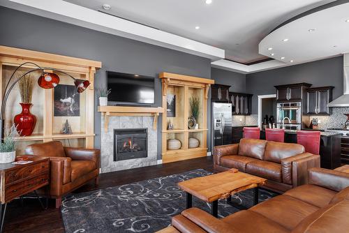 9864 Cathedral Drive, Silver Star, BC - Indoor Photo Showing Living Room With Fireplace