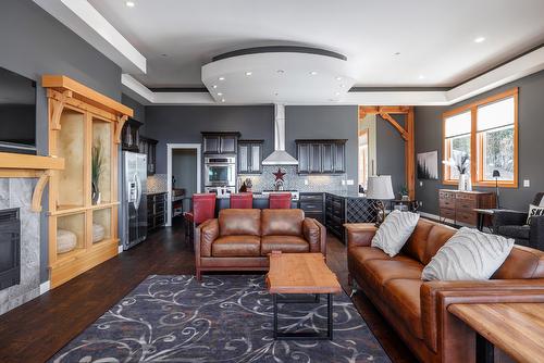 9864 Cathedral Drive, Silver Star, BC - Indoor Photo Showing Living Room With Fireplace