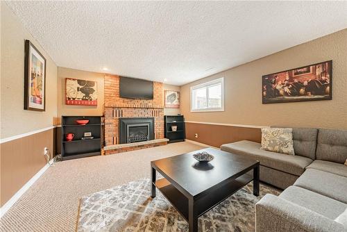 83 Forestgate Drive, Hamilton, ON - Indoor Photo Showing Living Room With Fireplace