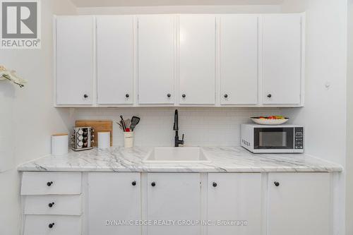 103 - 57 Mericourt Road, Hamilton (Ainslie Wood), ON - Indoor Photo Showing Kitchen