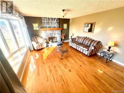 6390 Route 313, Petite-Lamèque, NB - Indoor Photo Showing Living Room With Fireplace