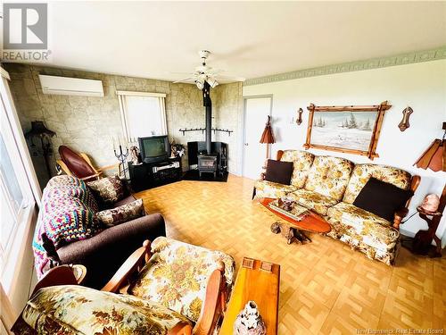 318 Rue De L'Ile, Caraquet, NB - Indoor Photo Showing Living Room With Fireplace