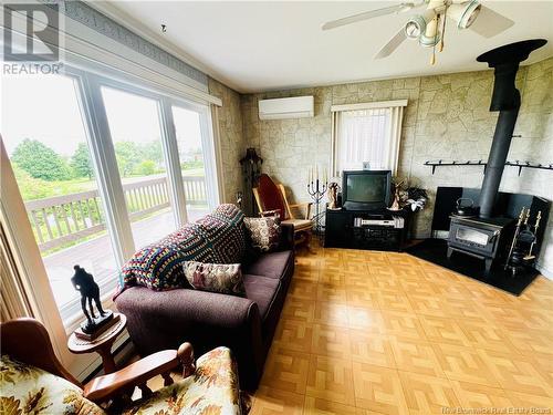 318 Rue De L'Ile, Caraquet, NB - Indoor Photo Showing Living Room With Fireplace