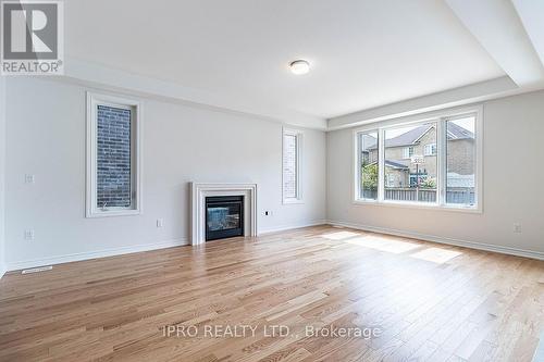 7 Dolomite Drive, Brampton, ON - Indoor Photo Showing Living Room With Fireplace