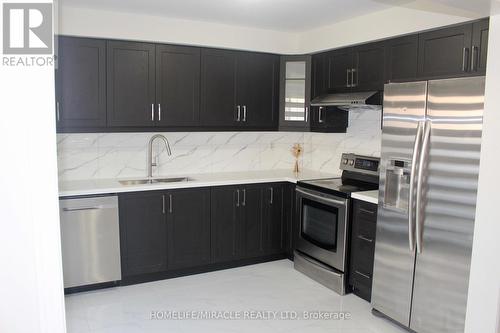 3 Canoe Glide Lane, Brampton (Sandringham-Wellington), ON - Indoor Photo Showing Kitchen With Double Sink