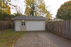 Parking for 2 cars in front of garage - 