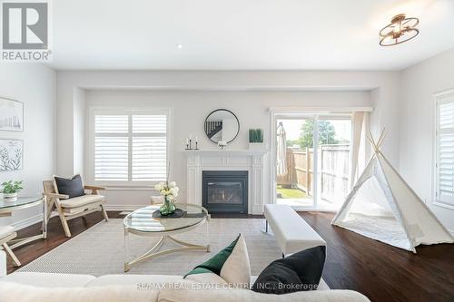 1 Sonoma Valley Crescent, Hamilton (Sheldon), ON - Indoor Photo Showing Living Room With Fireplace