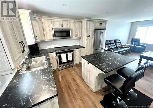 210 Rue Du Pêcheur Nord Unit# A-B, Lamèque, NB - Indoor Photo Showing Kitchen With Double Sink