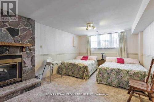 560 Bristol Road, Newmarket (Bristol-London), ON - Indoor Photo Showing Bedroom With Fireplace