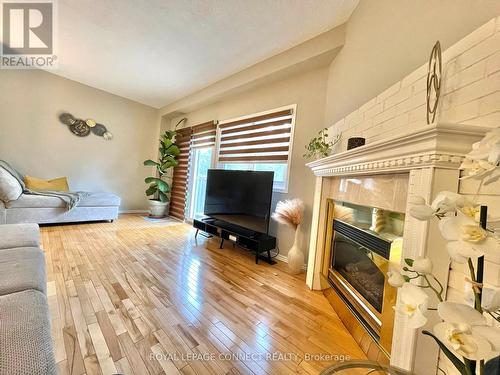 68 - 525 Meadows Boulevard, Mississauga (Rathwood), ON - Indoor Photo Showing Living Room With Fireplace