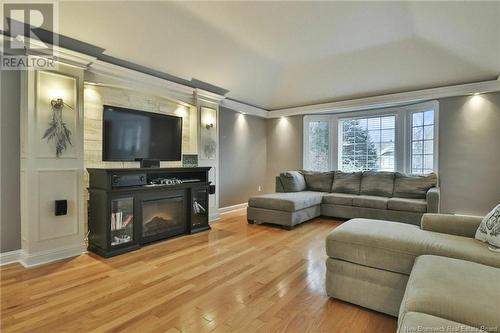 394 Ouellet, Shediac, NB - Indoor Photo Showing Living Room With Fireplace