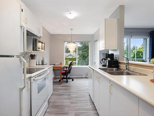 201A-698 Aspen Rd, Comox, BC - Indoor Photo Showing Kitchen With Double Sink