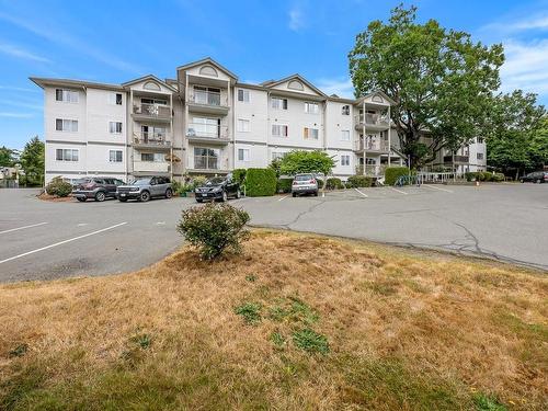 104-840 Braidwood Rd, Courtenay, BC - Outdoor With Balcony With Facade