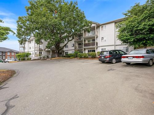 104-840 Braidwood Rd, Courtenay, BC - Outdoor With Balcony With Facade