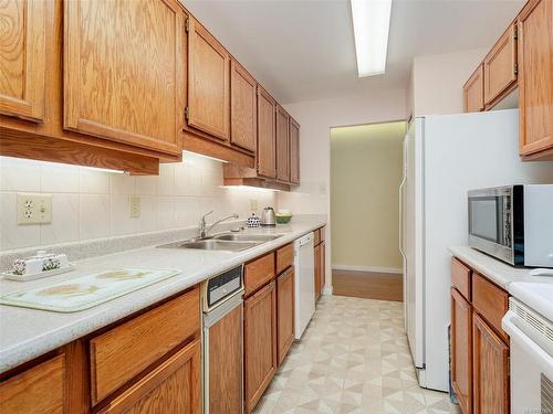 202-1204 Fairfield Rd, Victoria, BC - Indoor Photo Showing Kitchen With Double Sink