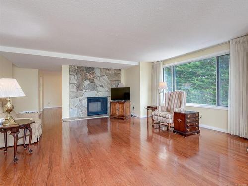 202-1204 Fairfield Rd, Victoria, BC - Indoor Photo Showing Living Room With Fireplace