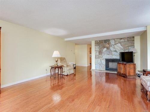 202-1204 Fairfield Rd, Victoria, BC - Indoor Photo Showing Living Room With Fireplace