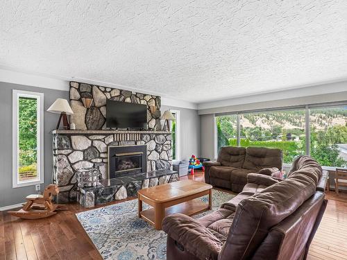 211 Blueberry Place, Kamloops, BC - Indoor Photo Showing Living Room With Fireplace