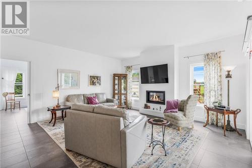 Living room with gas fireplace - 3630 Pattee Road, Hawkesbury, ON - Indoor Photo Showing Living Room With Fireplace