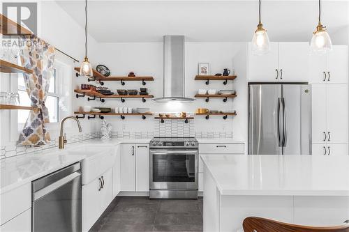 Open shelving, deep drawers - 3630 Pattee Road, Hawkesbury, ON - Indoor Photo Showing Kitchen With Upgraded Kitchen