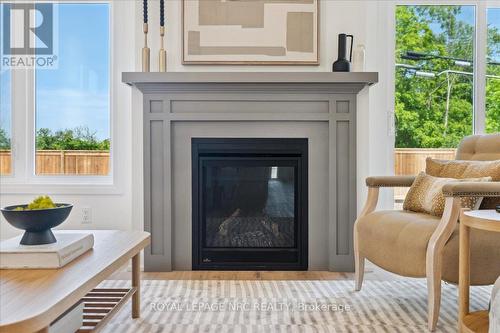 7 Beachwalk Crescent, Fort Erie, ON - Indoor Photo Showing Living Room With Fireplace