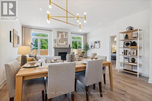 7 Beachwalk Crescent, Fort Erie, ON - Indoor Photo Showing Dining Room With Fireplace