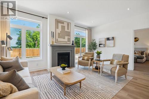 7 Beachwalk Crescent, Fort Erie, ON - Indoor Photo Showing Living Room With Fireplace