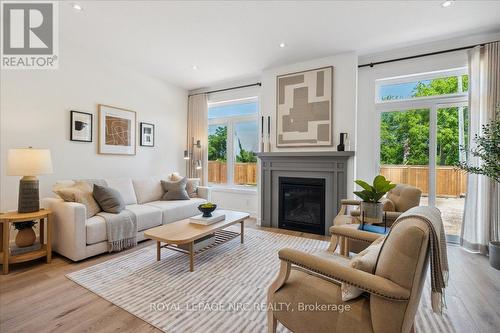 7 Beachwalk Crescent, Fort Erie, ON - Indoor Photo Showing Living Room With Fireplace