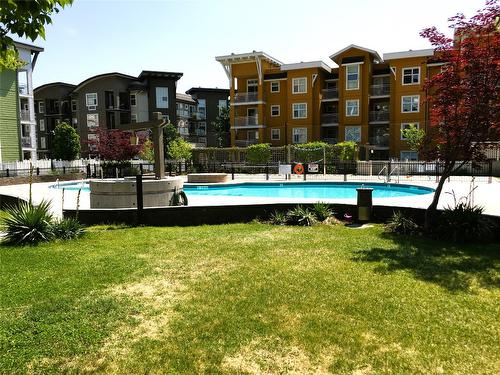 203-563 Yates Road, Kelowna, BC - Outdoor With In Ground Pool