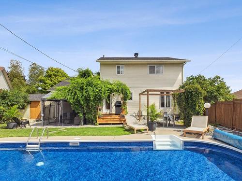 Back facade - 13 Rue De Sagard, Gatineau (Gatineau), QC - Outdoor With In Ground Pool With Backyard