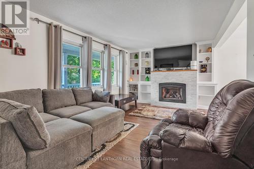 12 Mccabe Street, Greater Napanee, ON - Indoor Photo Showing Living Room With Fireplace