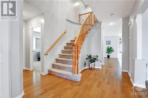 Chandelier above the staircase was updated in 2023 - 31 Forillon Crescent, Ottawa, ON - Indoor Photo Showing Other Room