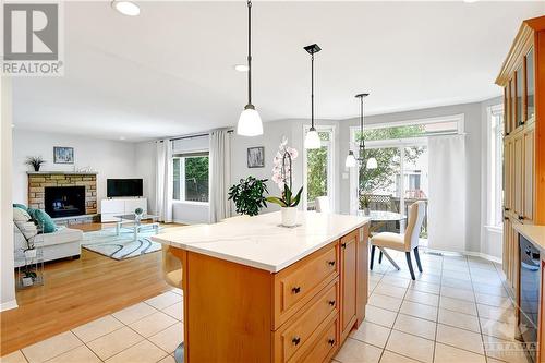 Large living room with the gas fireplace - 31 Forillon Crescent, Ottawa, ON - Indoor With Fireplace