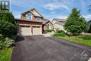 Large driveway can fit 4 cars, 6 cars can be parked total - 31 Forillon Crescent, Ottawa, ON  - Outdoor With Facade 