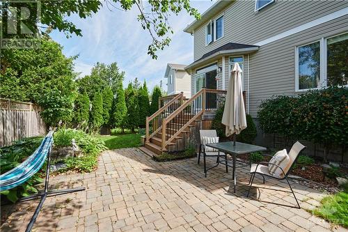 Patio, small garden on the side and pond for the relaxation - 31 Forillon Crescent, Ottawa, ON - Outdoor With Deck Patio Veranda