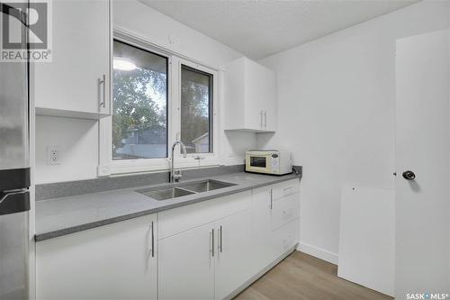 183 Magee Crescent, Regina, SK - Indoor Photo Showing Kitchen With Double Sink