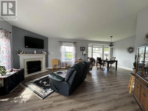 9789 255 Road, Fort St. John, BC - Indoor Photo Showing Living Room With Fireplace