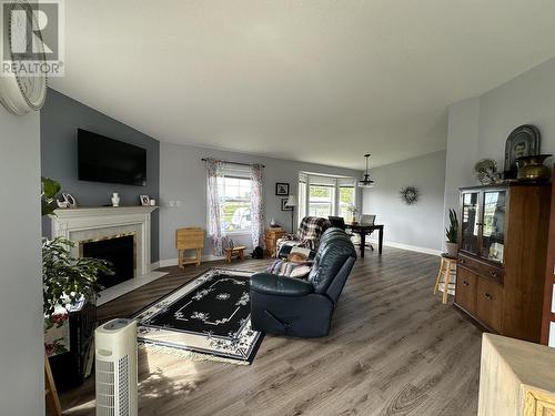 9789 255 Road, Fort St. John, BC - Indoor Photo Showing Living Room With Fireplace