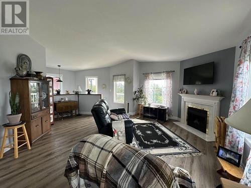 9789 255 Road, Fort St. John, BC - Indoor Photo Showing Living Room With Fireplace