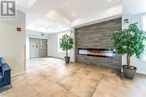 304 - 1370 Costigan Road, Milton, ON - Indoor With Fireplace