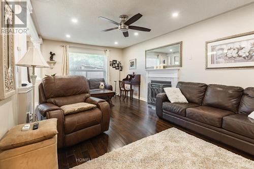 48 Prince Of Whales Drive, Barrie (Innis-Shore), ON - Indoor Photo Showing Living Room With Fireplace