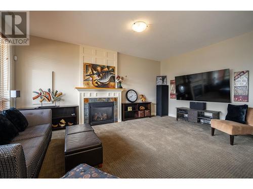 7551 Tronson Road, Vernon, BC - Indoor Photo Showing Living Room With Fireplace