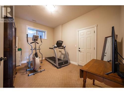 7551 Tronson Road, Vernon, BC - Indoor Photo Showing Gym Room