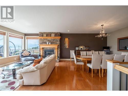 7551 Tronson Road, Vernon, BC - Indoor Photo Showing Living Room With Fireplace